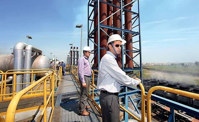 The Nishat Group produces more than 12% of the electricity generated in Pakistan. Seen here is Mian Mansha’s youngest son, Hassan Mansha (in the foreground), who handles the group’s power business, at one of the group’s four plants, 60 kilometres from Lahore.