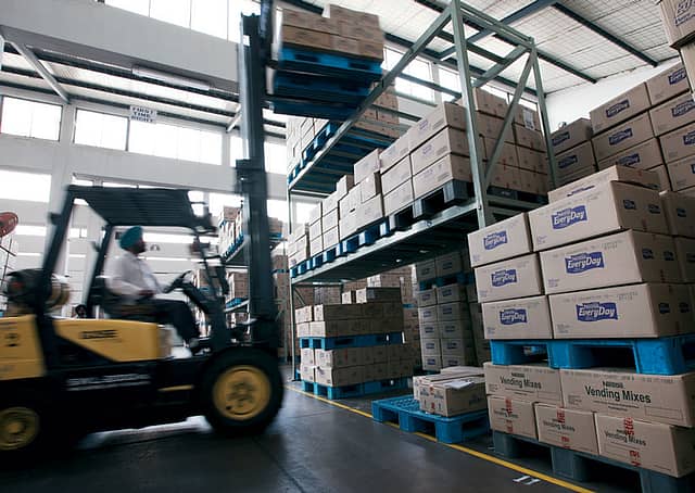 Milk being offloaded from a tanker at the Moga factory.