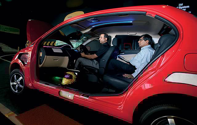 Subodh Jindal (left), executive director, transportation business, seen here with Raja Krishnamurthy, executive director, technical, make a case for automobile servicing .