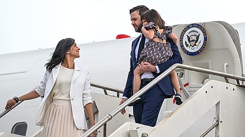 U.S. Vice President JD Vance carries his daughter Mirabel as he disembarks Air Force Two with Second Lady Usha Vance at G.B. Pastine-Rome Ciampino Airport on April 18, 2025 in Rome, Italy. Vance is traveling to Italy and India.