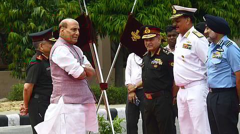 Indian Defence Minister Rajnath Singh (2nd left) with (from left) Chief of Defence Staff General Anil Chauhan (L), Army chief General Upendra Dwivedi, Navy chief Admiral Dinesh Kumar Tripathi, and Air Force chief Marshal Amar Preet Singh.