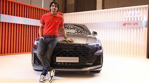Neeraj Chopra with the Audi RS Q8, which has been described by the carmaker as its most powerful SUV, and is currently sold out in India until Q3 2025.