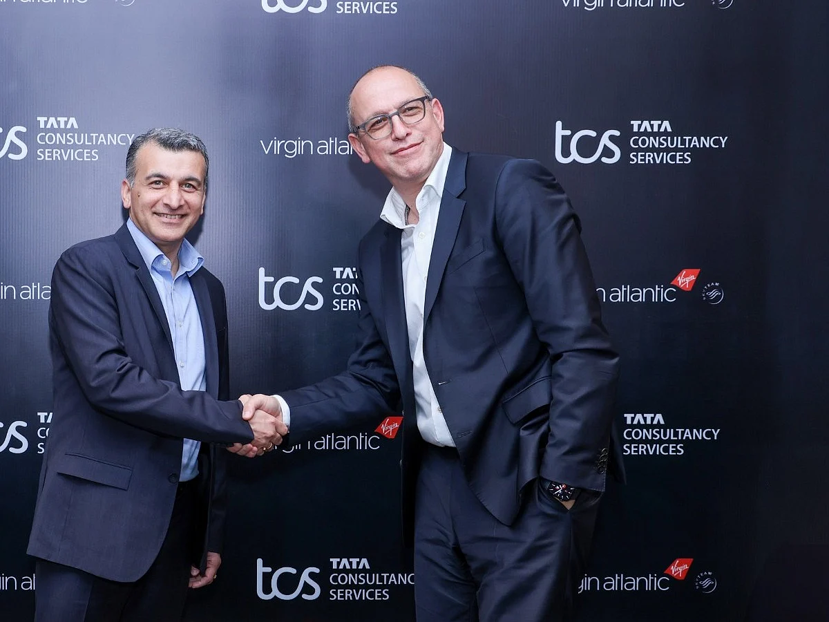 Tata Consultancy Services Country Head - UK & Ireland Amit Kapur (left), with Virgin Atlantic CEO Shai Weiss.