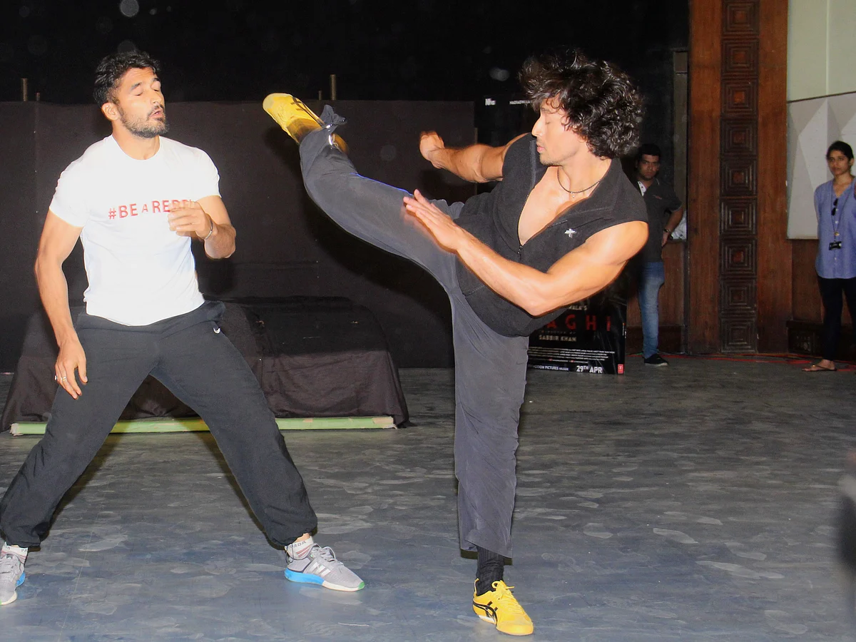 Bollywood actor Tiger Shroff showcases martial arts stunts for the promotion of the film Baagi at Mehboob Studio in Mumbai.