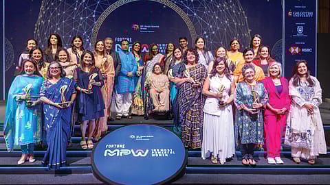 Nitin Gadkari, Union Minister of Road Transport and Highways; Shashwat Goenka, vice chairman, RP-Sanjiv Goenka Group; and Sourav Majumdar, Editor-in-Chief, Fortune India, with the winners of Fortune India's Most Powerful Women 2025 awards in Mumbai.