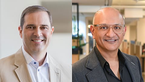 Cisco Systems, led by CEO Chuck Robbins and Jeetu Patel (right), is reinventing itself as an AI-first company.