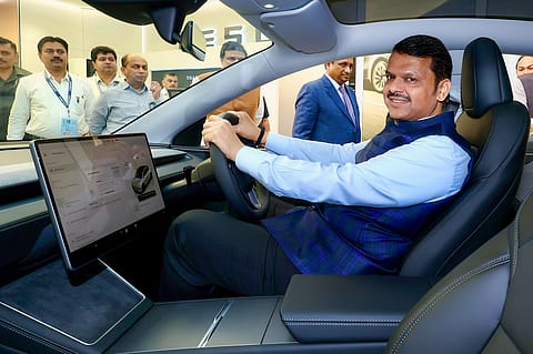 Devendra Fadnavis, Maharashtra CM, inaugurating Tesla's first experience centre in Mumbai's Bandra Kurla Complex.