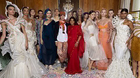 The designer, Vaishali Shadangule, (in the centre in red) at the end of her showing