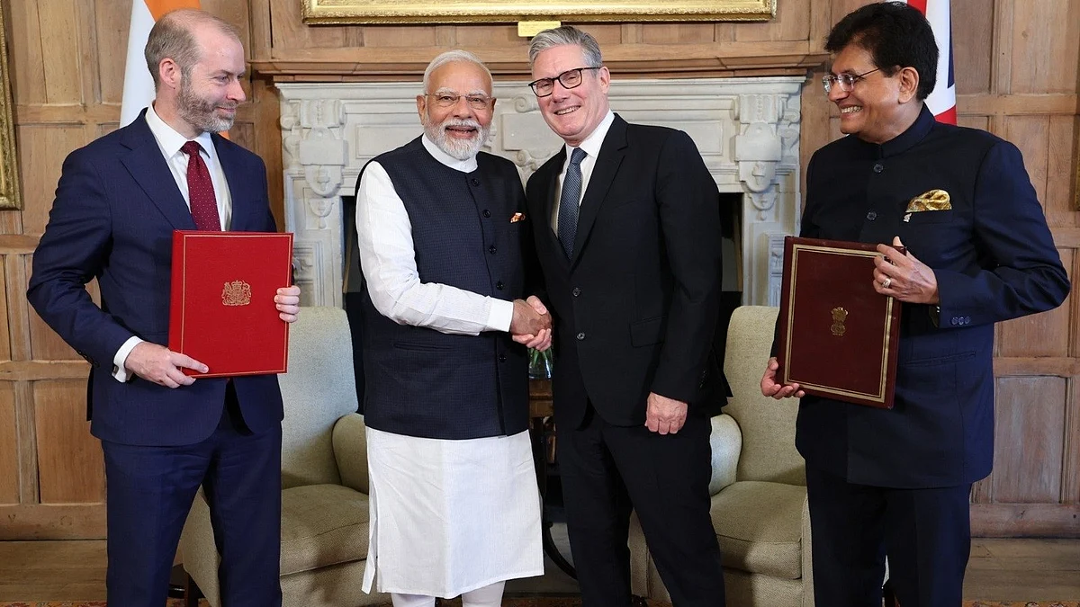 Prime Minister Narendra Modi and Commerce and Industry Minister Piyush Goyal with UK Prime Minister Keir Starmer and Secretary of State for Business and Trade Jonathan Reynolds (left)