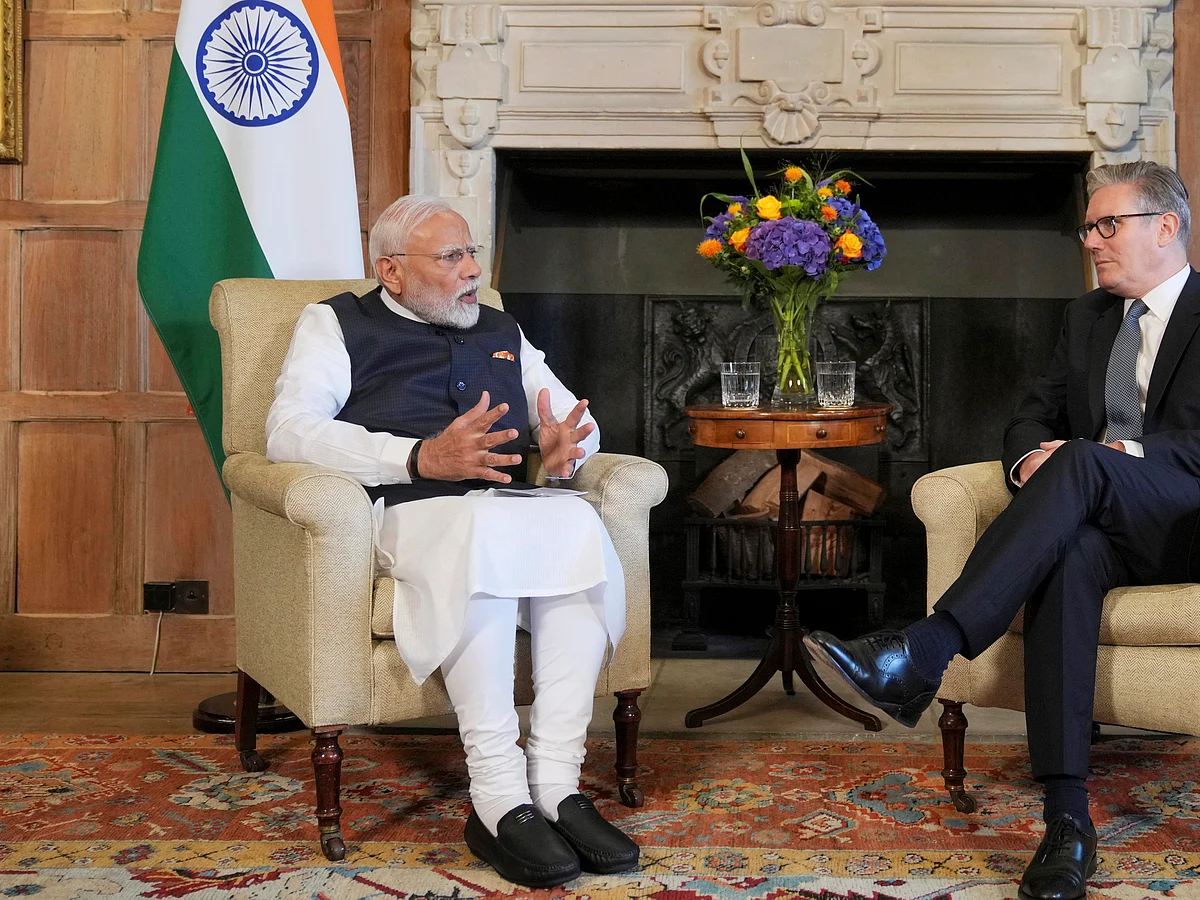 Prime Minister Narendra Modi with UK PM Keir Starmer (right).