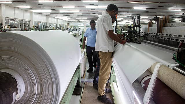 Readymade garment industry to take a 50% dent due to tariff blows: Crisil