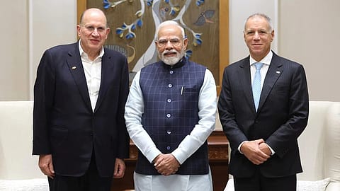 (Left to Right) HSBC Group Chairman Mark Tucker, Prime Minister Narendra Modi and HSBC Group CEO Georges Elhedery
