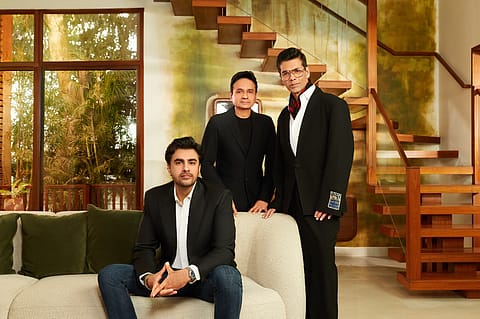 The move marks a strategic reset for the company’s talent vertical, positioning it as Dharma’s exclusive platform for artist representation across multiple cultural industries. (L-R) Uday Singh Gauri, CEO, DCAA, Apoorva Mehta, CEO, Dharma Productions and Karan Johar, Filmmaker.
