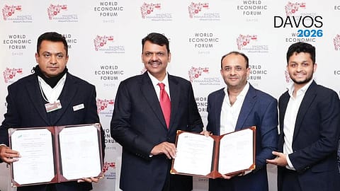 Chief Minister Devendra Fadnavis and SBG Group Chairman Saurabh Bora at the MoU signing ceremony in Davos.