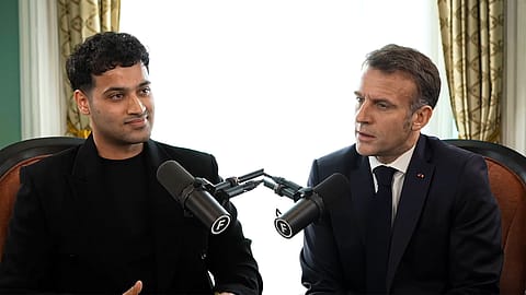 In a wide-ranging conversation, Macron addressed Europe’s structural disadvantages in scale and capital, defended France’s foreign-backed AI infrastructure push, and articulated why India is central to his vision of a more multipolar global order. [L-R] Raj Shamani and Emmanuel Macron