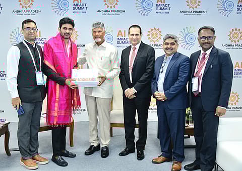 Andhra Pradesh Chief Minister N. Chandrababu Naidu with Sridhar Gadhi (second from left), Founder and Executive Chairman, Quantela Inc, at the India AI Impact Summit 2026, in New Delhi. 