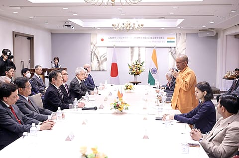 UP CM Yogi Adityanath speaking to Japanese officials during his visit.