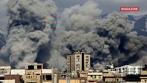 Smoke rises after a series of explosions in Tehran on March 1.