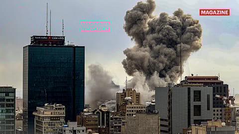 A general view of Tehran with smoke visible in the distance after explosions were reported in the city on March 2, 2026.