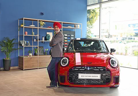 Hardeep Singh Brar, President & CEO, BMW Group India with theine MINI Cooper S Victory Edition