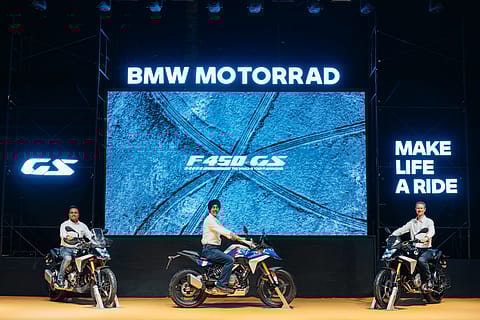 Shardenduu Chaturvedi, Director, BMW Motorrad India, Hardeep Singh Brar, President and CEO, BMW Group India and Christian Galli, Managing Director of Region Asia-Pacific, Middle East & Africa, BMW Motorrad with the new BMW F 450 GS.