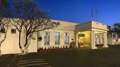 The club occupies a prime parcel of land in Lutyens' Delhi, immediately adjacent to the Prime Minister's residence on Lok Kalyan Marg.