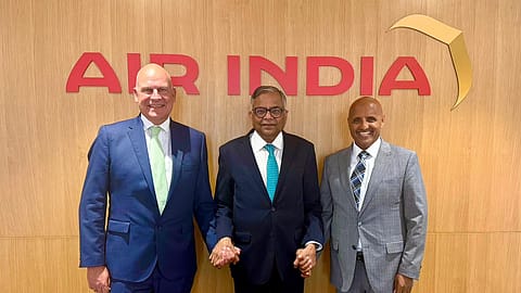 Air India incoming CEO and MD Tewolde Gebremariam with Tata Sons and Air India Chairman N Chandrasekaran and outgoing CEO and MD Campbell Wilson at the airline’s townhall in New Delhi on Monday.