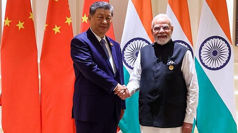 Prime Minister Narendra Modi with Chinese President Xi Jinping on the sidelines of the BRICS Summit, in New Delhi on Saturday.