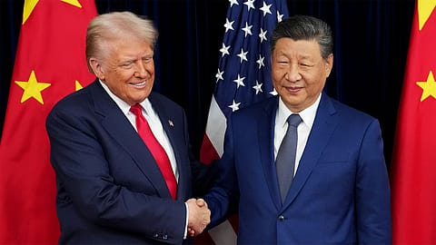 US President Donald Trump and Chinese President Xi Jinping during a previous meeting, as the two leaders prepare for talks on trade, technology, AI and critical mineral supply chains.