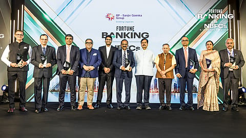 (From left) Raju Dodti, Whole-time Director and Chief Operating Officer, L&T Finance; B. Ramesh Babu, MD & CEO, Karur Vysya Bank; Arijit Sanyal, MD & CEO, Credila; Sourav Majumdar, Editor-in-Chief, Fortune India; Shashwat Goenka, Vice Chairman, RPSG Group; C.S. Setty, Chairman, SBI; Mangal Prabhat Lodha, Minister for Skill, Employment, Entrepreneurship and Innovation, Government of Maharashtra; Satish Marathe, Director, Central Board, RBI; Paritosh Kashyap, Whole-time Director, Kotak Mahindra Bank; Kalika Tandekar, Senior GM, PFC; and Nidhu Saxena, MD & CEO, Bank of Maharashtra.