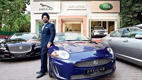 Spot the salesman: Gurmeet Singh Anand at his Jaguar Land Rover dealership in Delhi.