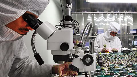 Engineers reassemble dismantled hard disks laid out in the clean room of Stellar Data Recovery.