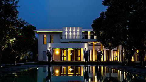 (From left) North India Sotheby’s International realty founders Ashwin Chadha, Ankit Tyagi, and Amit Goyal at Delhi’s Amaya White Mansion, a luxury villa with a price tag of $19 million