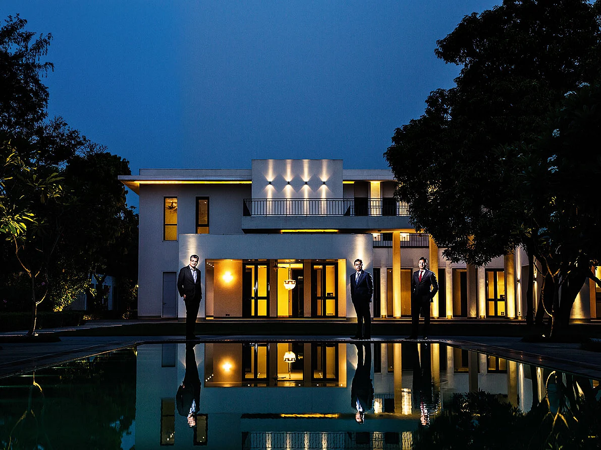 (From left) North India Sotheby’s International realty founders Ashwin Chadha, Ankit Tyagi, and Amit Goyal at Delhi’s Amaya White Mansion, a luxury villa with a price tag of $19 million