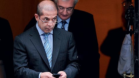 Atul Punj exists 10, Downing Street, during a visit to Britain in February.