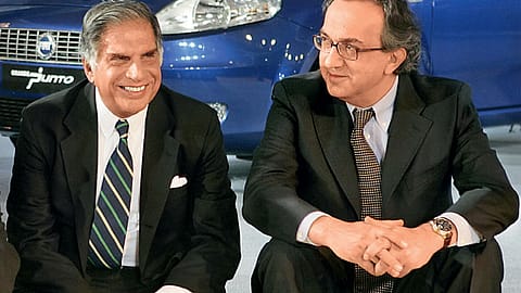 Looking good: Marchionne (R) ditches his trademark sweater as he buttons up for business with Ratan Tata, chairman, Tata Group.