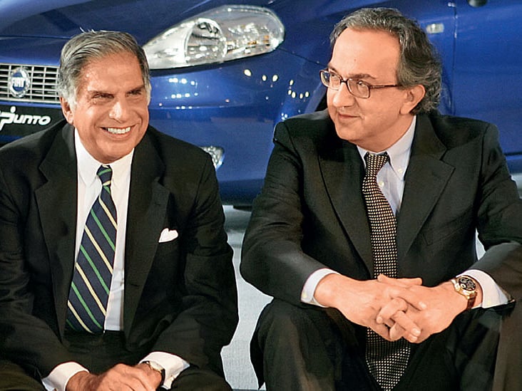 Looking good: Marchionne (R) ditches his trademark sweater as he buttons up for business with Ratan Tata, chairman, Tata Group.