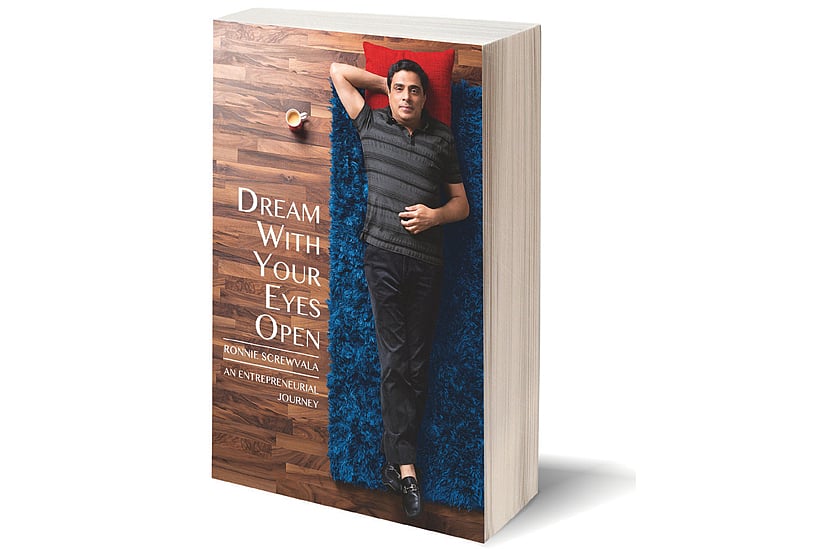 An entrepreneur plays peekaboo