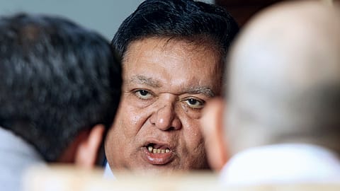 A.M. Naik
