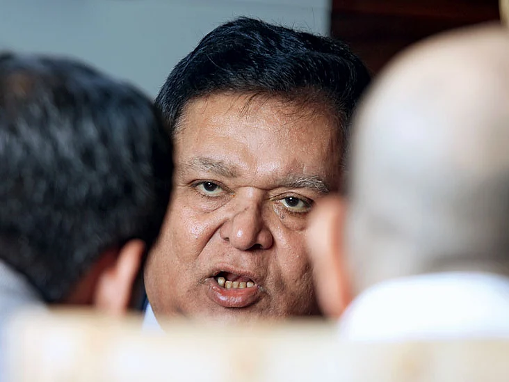 A.M. Naik