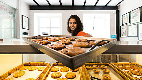 Neha Sethi in her bakery this generation doesn’t want to wait till retirement to find time for things they love.