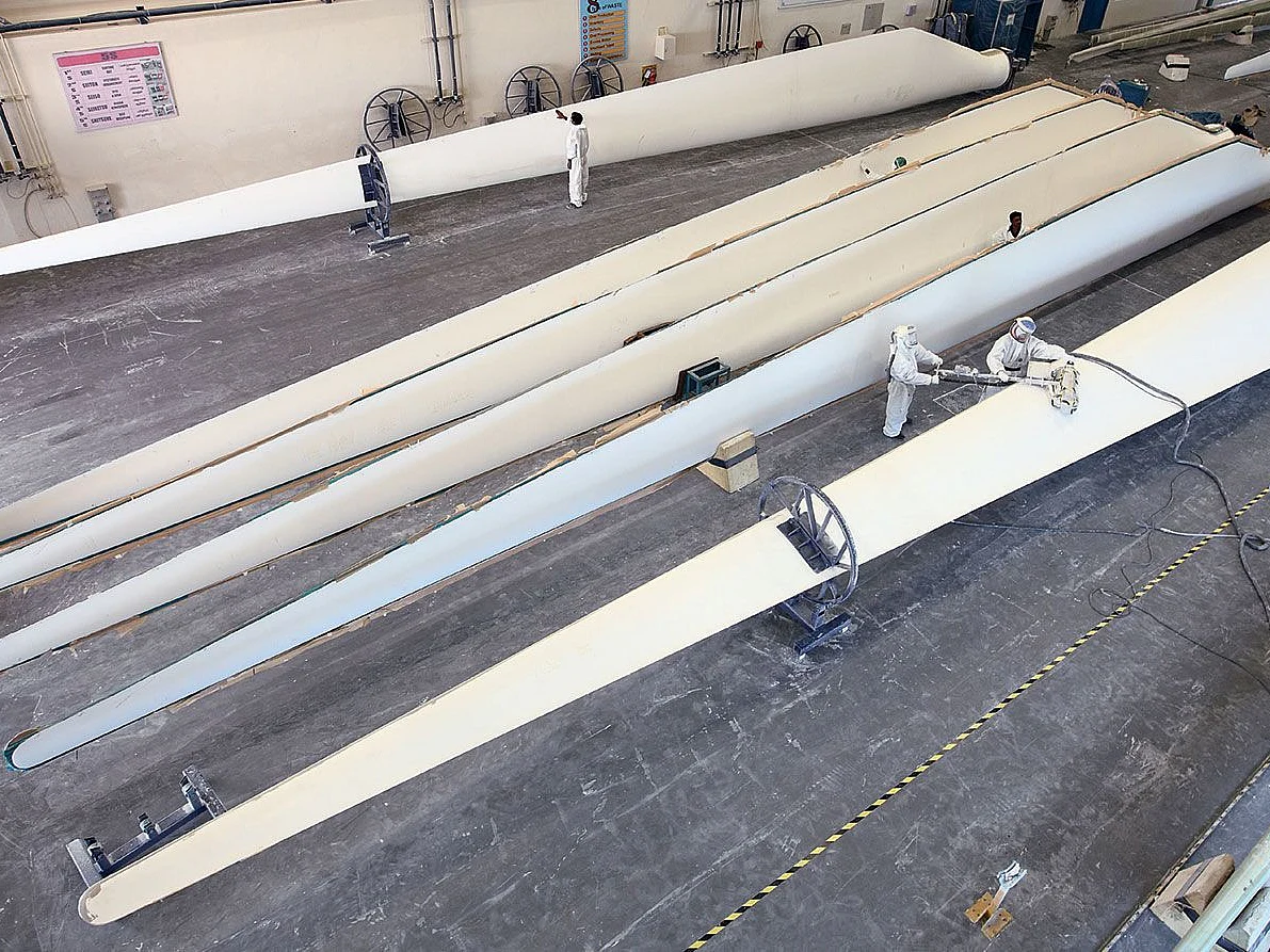 Wind turbine blades inside the Chennai factory of RRB Energy. A single blade can measure upwards of 23 metres. 