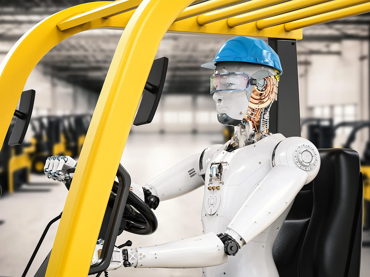 A robot controls a forklift truck.