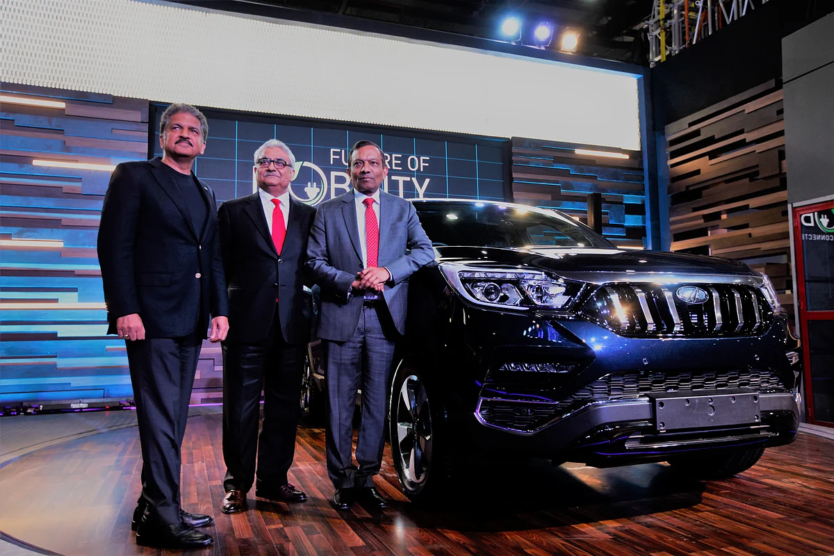 Anand Mahindra, Rajan Wadhera and Pawan Goenka at Auto Expo 2018, in Greater Noida.