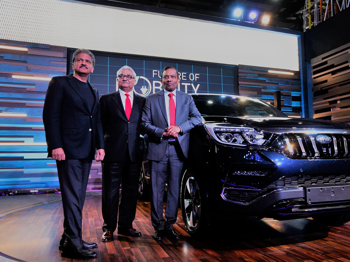 Anand Mahindra, Rajan Wadhera and Pawan Goenka at Auto Expo 2018, in Greater Noida.
