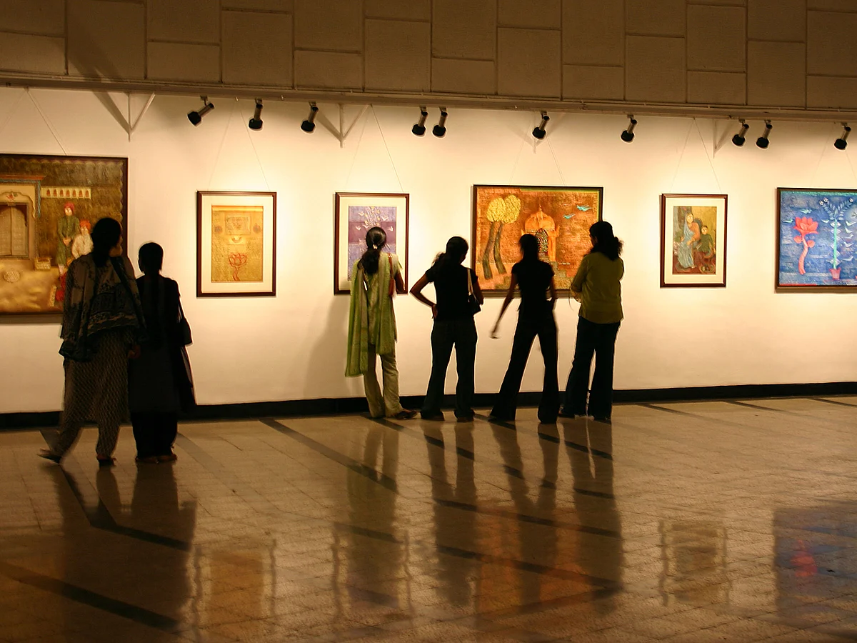 A painting exhibition in Auditorium Hall of Jehangir Art Gallery at Kala Ghoda, Mumbai. Photo by Alamy