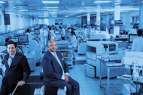 Dr Lal PathLabs chairman and managing director Dr Arvind Lal (right); and CEO Om Manchanda.