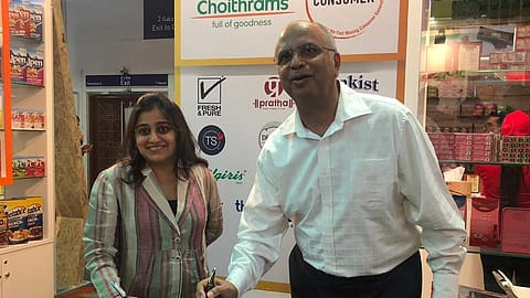 Ashni Biyani, Managing Director, Future Consumer Limited signing the MOU with L.T. Pagarani, Chairman, Choithrams