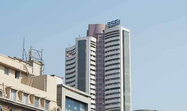 Budget fine print drags markets down