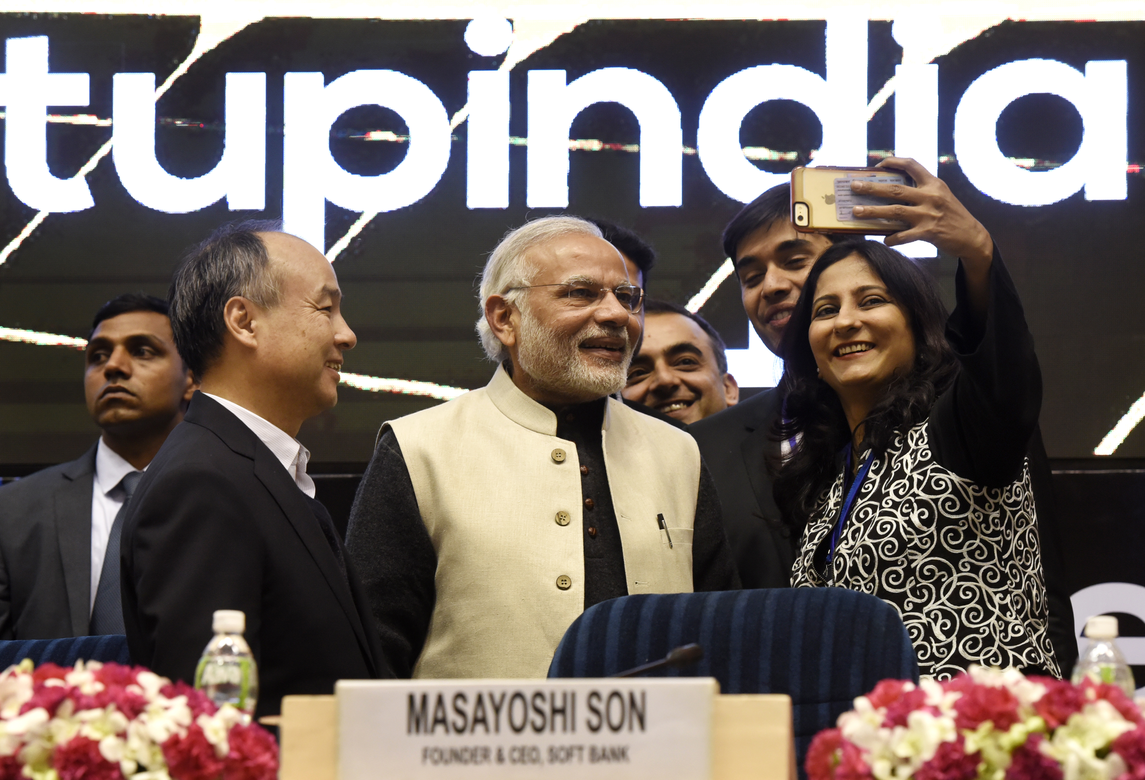 Prime Minister Narendra Modi poses for a selfie with young founders of companies at the launch of Start-Up India at Vigyan Bhavan on January 16, 2016 in New Delhi.